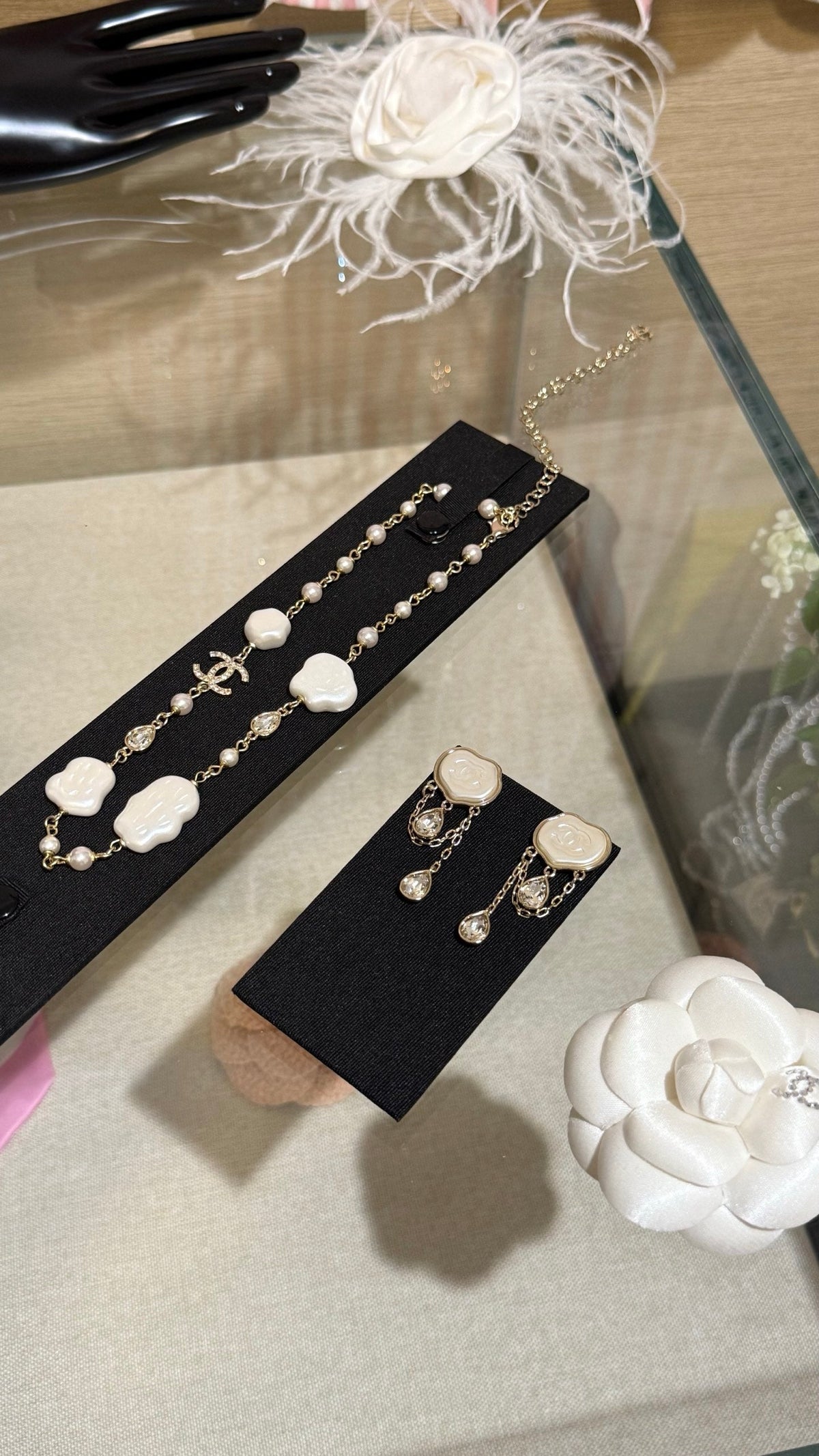 Chanel Cloud Double C Resin Double Teardrop Crystal Light Gold Chain Tassel Earrings